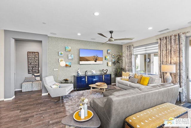 living room with ceiling fan and wood-type flooring