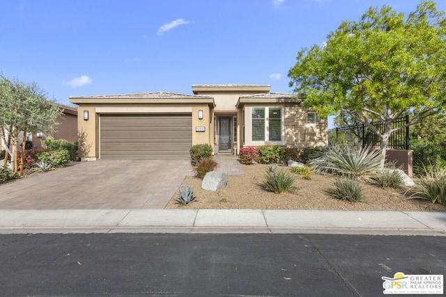 view of front of home with a garage