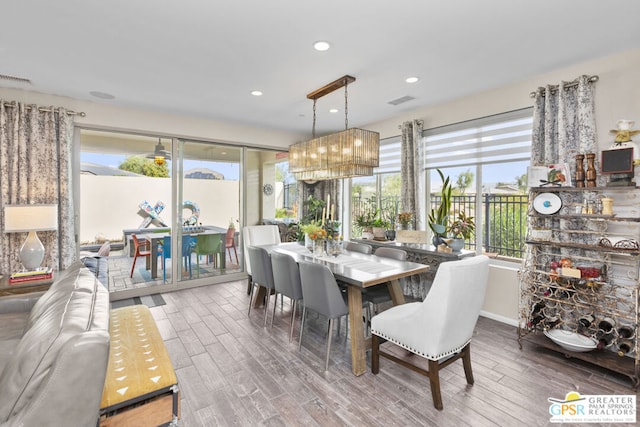 dining area featuring a chandelier