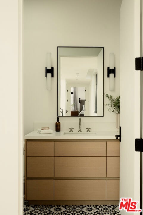 bathroom featuring vanity and tile patterned floors