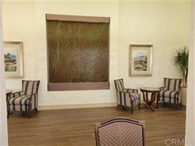 living area featuring dark wood-type flooring