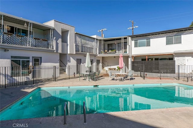 view of pool featuring a patio area