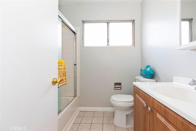 full bathroom with toilet, combined bath / shower with glass door, tile patterned flooring, and vanity