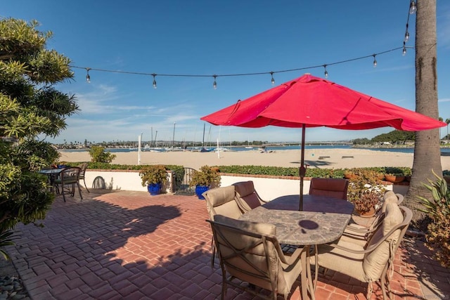 view of patio / terrace with a water view