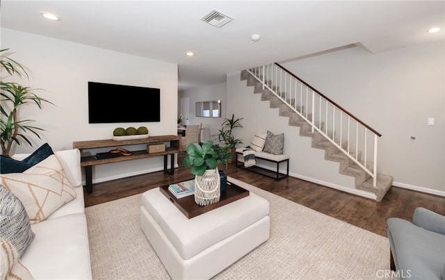 living room featuring wood-type flooring