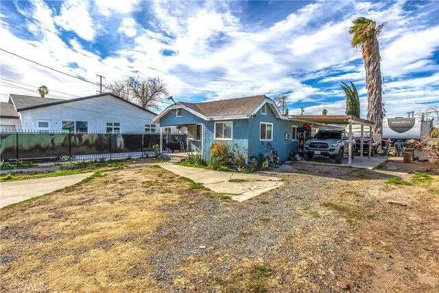 view of front of house featuring a carport