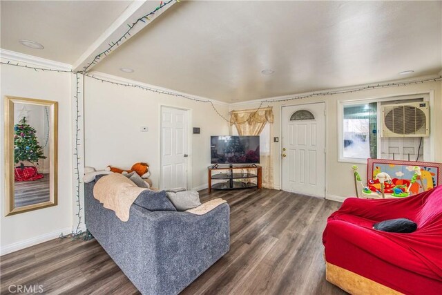 living room with dark hardwood / wood-style floors and crown molding