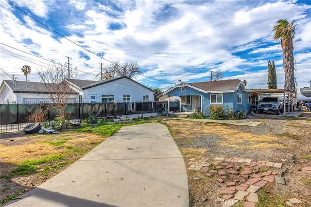 bungalow featuring a carport