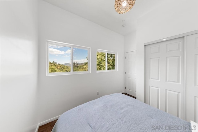 bedroom featuring lofted ceiling