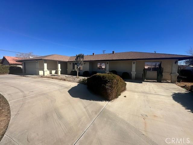 single story home with a garage