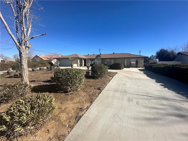 single story home with a garage