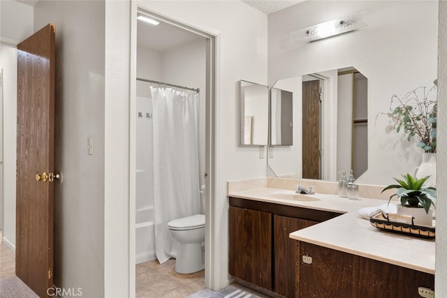 full bathroom with vanity, toilet, and shower / bath combo with shower curtain