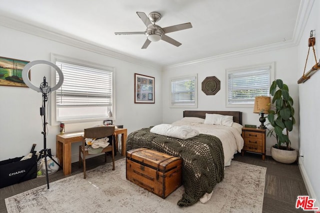 bedroom with ceiling fan and crown molding