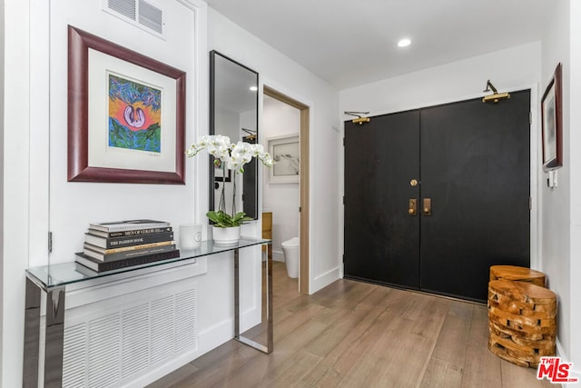 foyer entrance featuring light hardwood / wood-style flooring