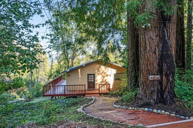 exterior space featuring a wooden deck