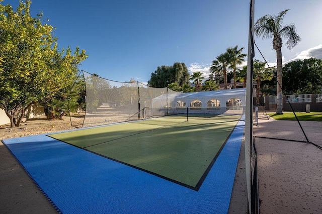 exterior space with tennis court