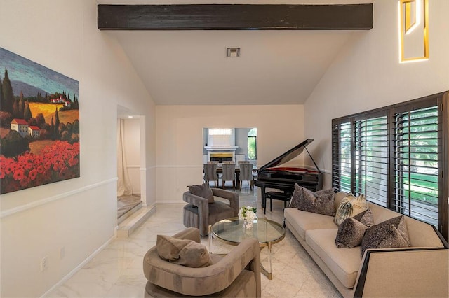 living room featuring high vaulted ceiling and beamed ceiling