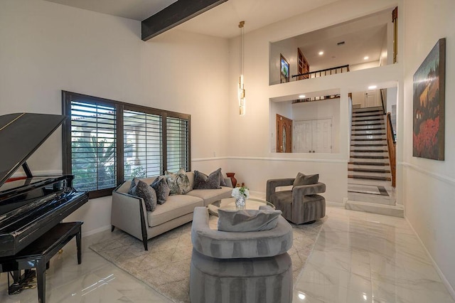 living room featuring beam ceiling