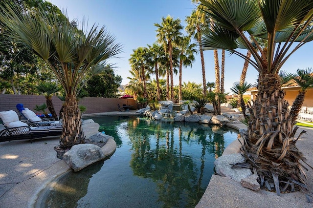 view of swimming pool featuring a patio area