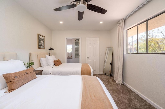 bedroom featuring ceiling fan and carpet flooring