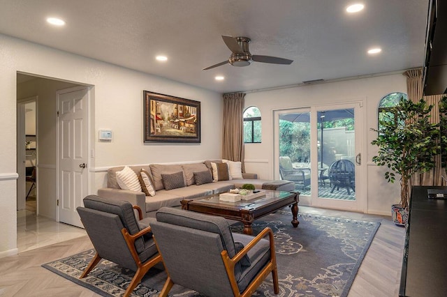 living room with ceiling fan