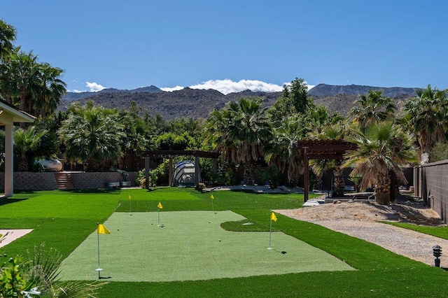 surrounding community with a pergola and a mountain view