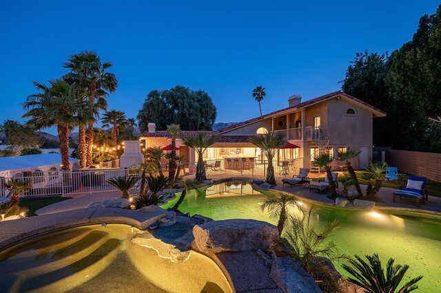 view of yard with a patio area and a balcony