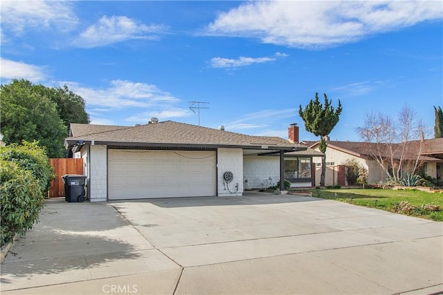 single story home with a garage