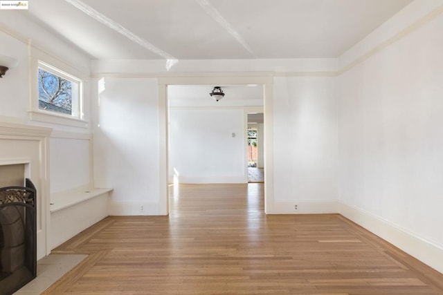 unfurnished living room with light wood-type flooring