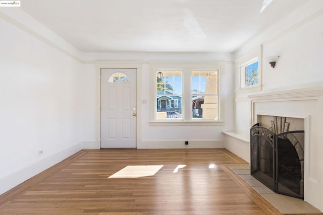 entrance foyer featuring hardwood / wood-style flooring