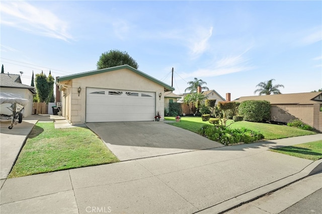 single story home featuring a front lawn and a garage