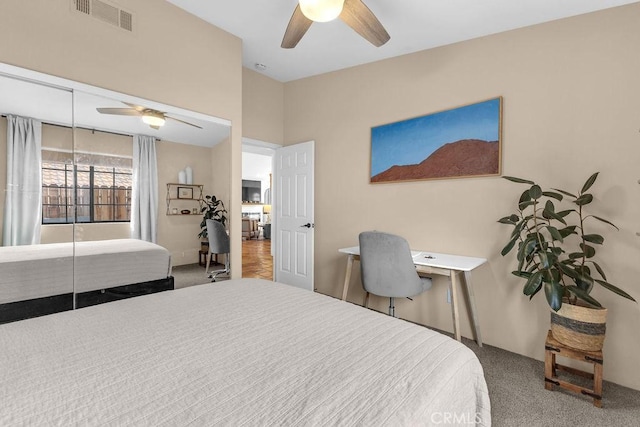 carpeted bedroom with ceiling fan