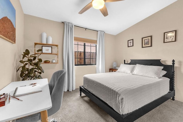 bedroom featuring light carpet, ceiling fan, and lofted ceiling