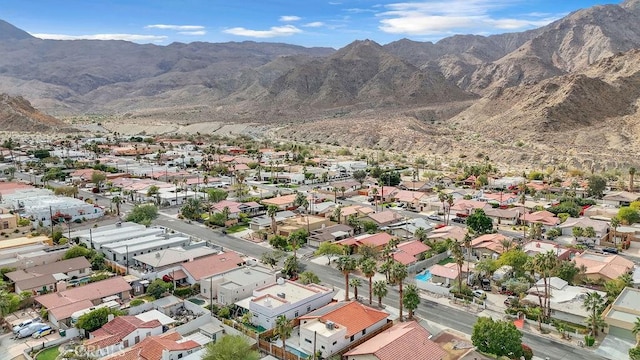 drone / aerial view featuring a mountain view