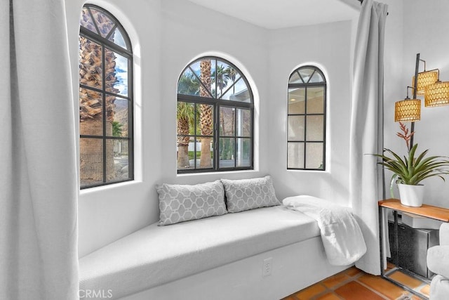 sitting room with tile patterned floors