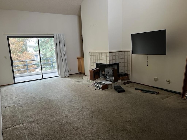 unfurnished living room featuring carpet floors