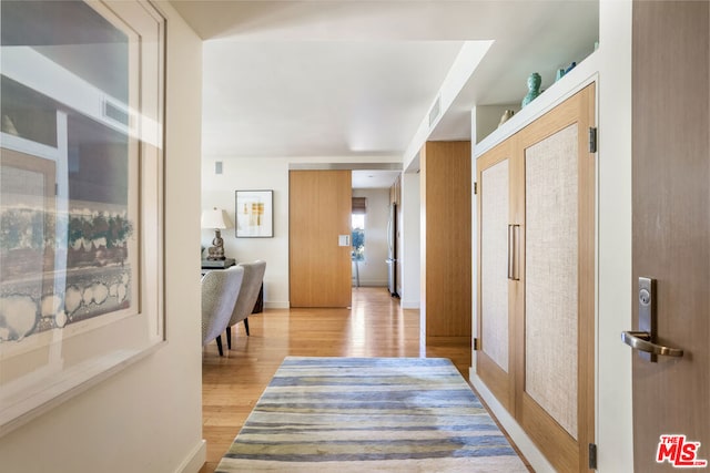 hall featuring light wood-type flooring