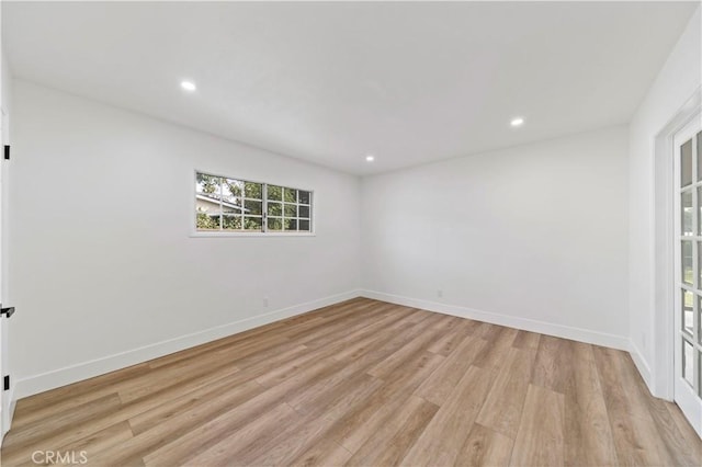 empty room featuring light hardwood / wood-style floors