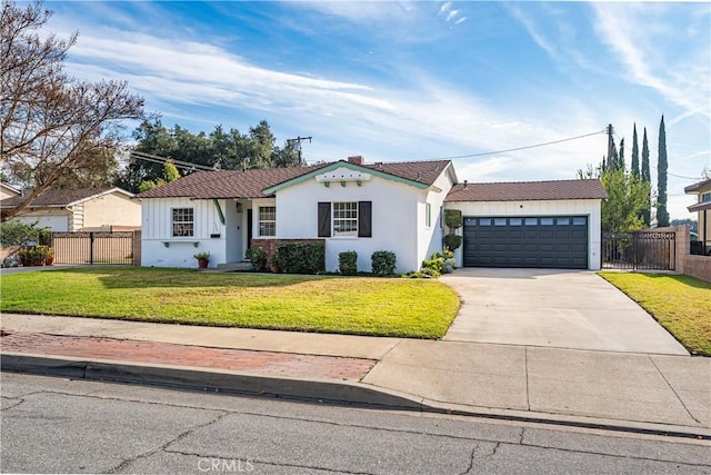 ranch-style house featuring a front lawn and a garage