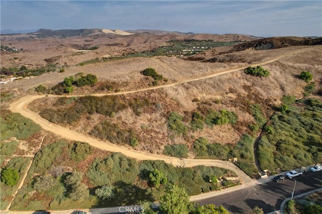 bird's eye view with a mountain view