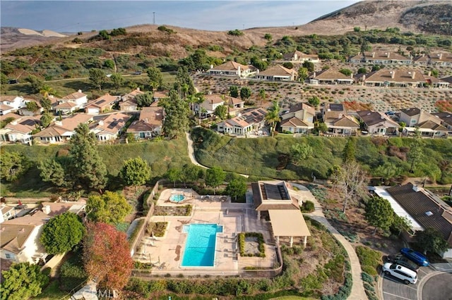 birds eye view of property featuring a mountain view