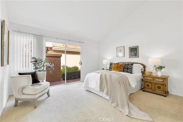 bedroom with carpet, access to exterior, and high vaulted ceiling