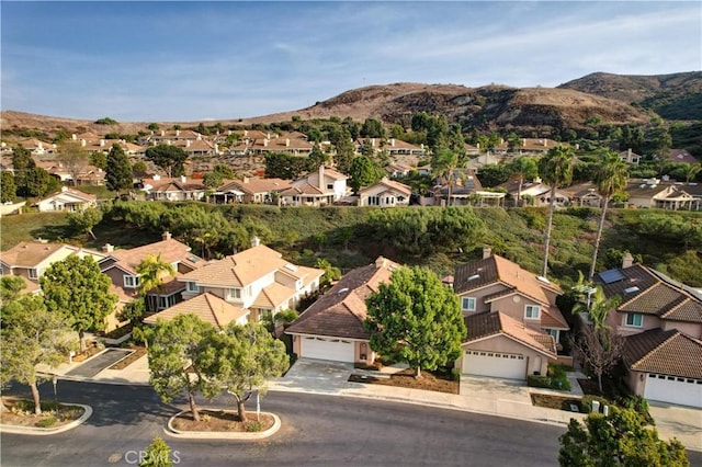 drone / aerial view featuring a mountain view