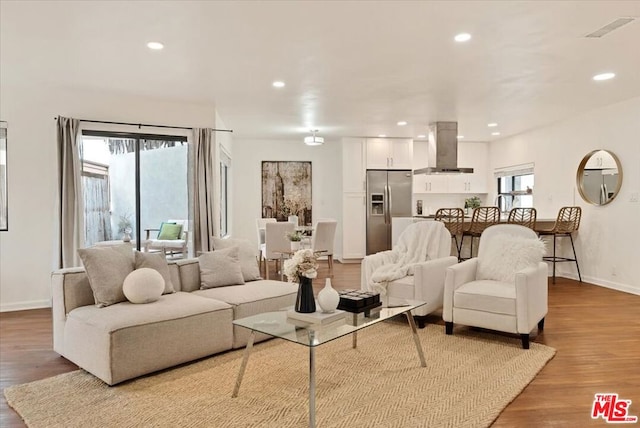 living room featuring light hardwood / wood-style floors