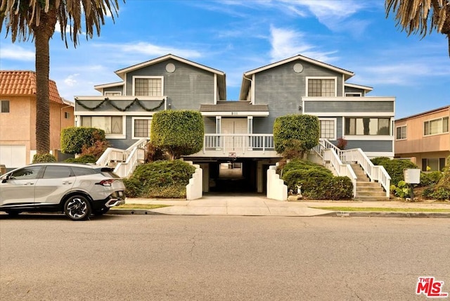 view of front of home featuring a carport