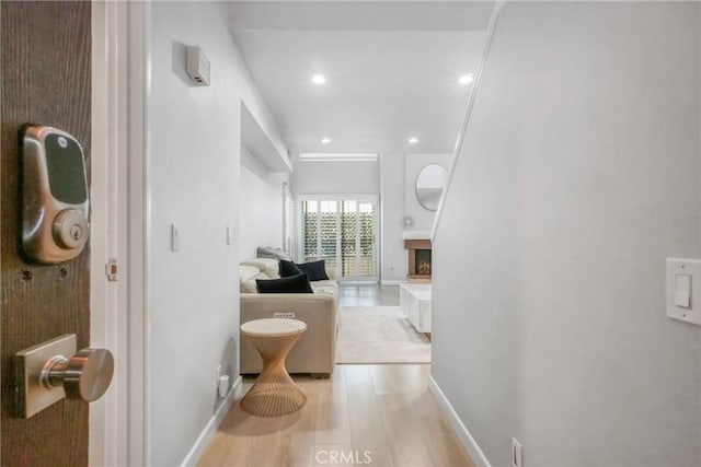 corridor featuring light hardwood / wood-style flooring