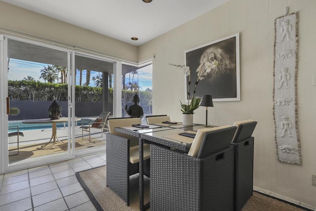 dining space featuring tile patterned flooring