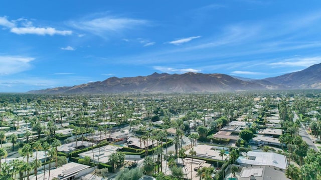 birds eye view of property featuring a mountain view