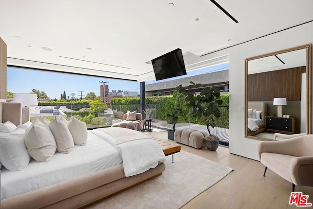 bedroom featuring light wood-type flooring