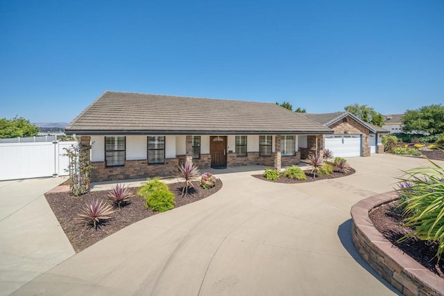 view of front of property with a garage